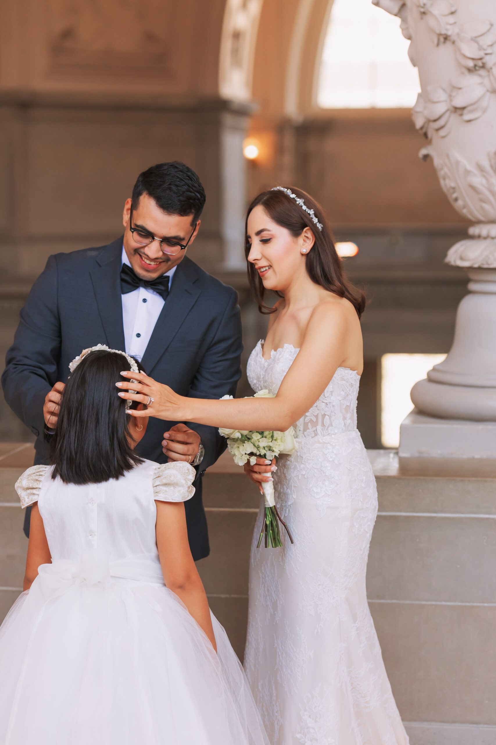 Bride and Groom with their Daughter at SF City Hall